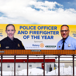 Billboard showing the police and firefighter of the year